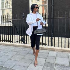 woman in capris and button down shirt